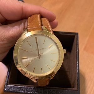 Michael Kors leather band watch.